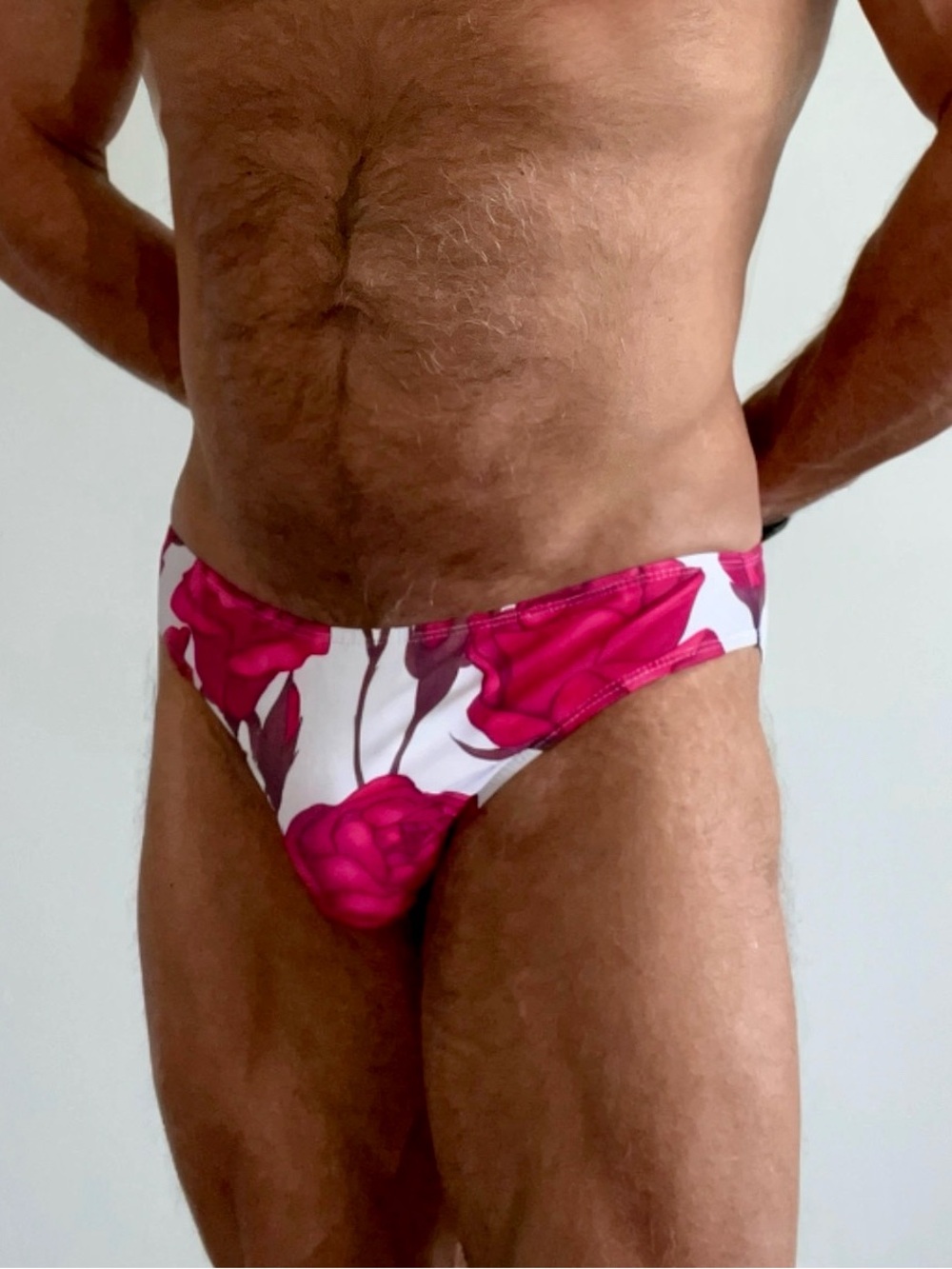 Men's Low-Rise Swim Briefs in Fuchsia Floral on White, Medium, front lined